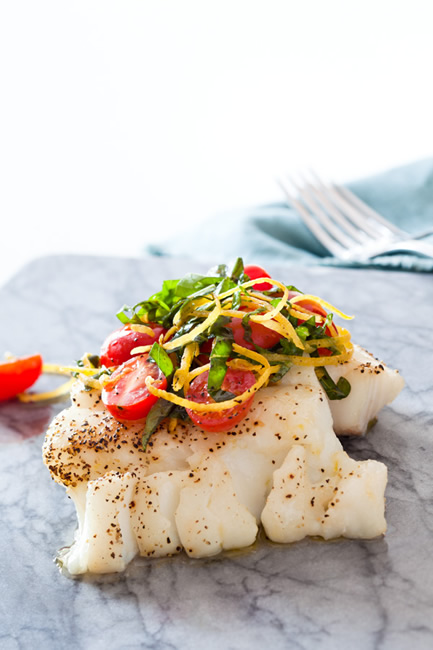 Roasted cod with baby tomato, basil and lemon salad 